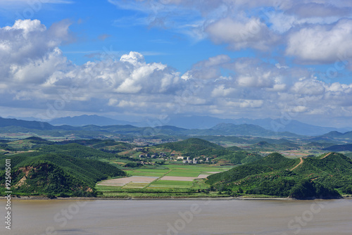 DMZ, Gimpo-si, Gyeonggi-do, South Korea - July A, 2022: Aerial view of Han River and territory of Kaepung County of North Korea photo