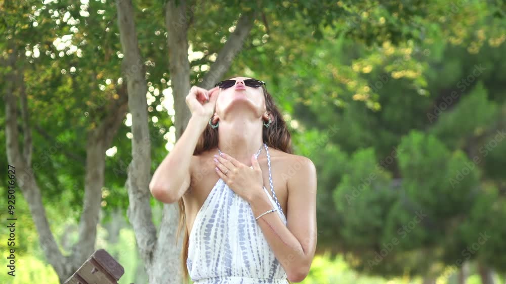 Reduce Jaw Line Face Yoga Exercise girl doing in park in nature Reduce Jaw Line Face Yoga Exercise girl doing in park in nature