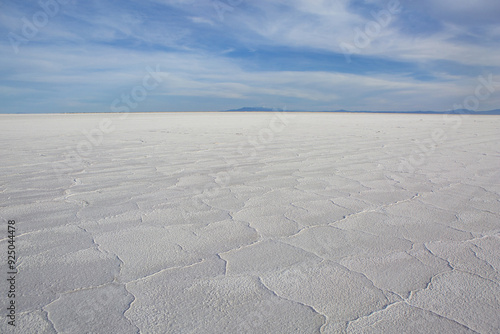 Sunset view of drought salt floor with the background of land horizon at Bonneville Salt Flats near Utah, USA