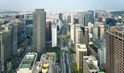 Jongno-gu, Seoul, South Korea - June 20, 2022: Aerial view of Cheonggye Creek surrounded by high rise buildings in summer