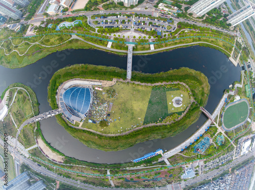 Seo-gu, Incheon, South Korea - June 25, 2022: Aerial top and wide angle view of island with bridges of Lake Park at Cheongna International City in summer photo