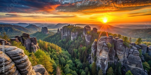 Spectacular sunrise over the sandstone formations of S?chsische Schweiz in Gohrisch photo