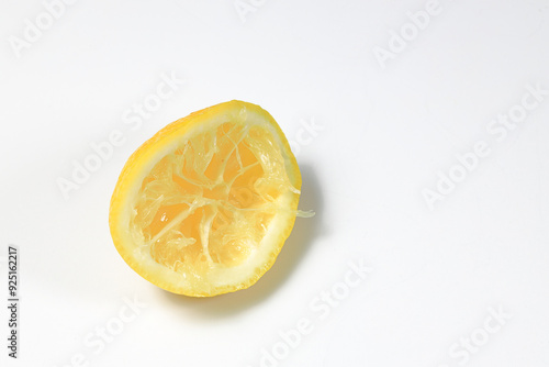 Fresh squeezed lemon fruit isolated on white background.