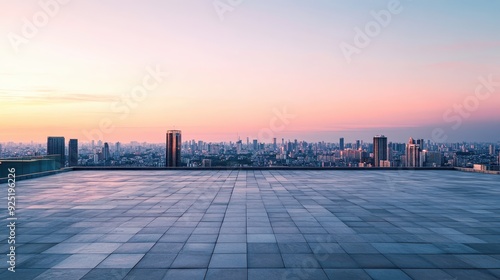 Scenic urban rooftop view at sunset, featuring a wide-open sky, modern cityscape, and serene atmosphere. Ideal for concepts of freedom and inspiration.