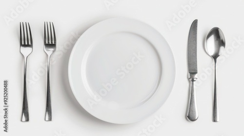 Empty plate, Spoon, fork, knife, white background, isolated, top view. Stock photo --ar 16:9 --style raw --v 6 Job ID: cc9686cf-b4d5-434e-b116-fd154e6c2635