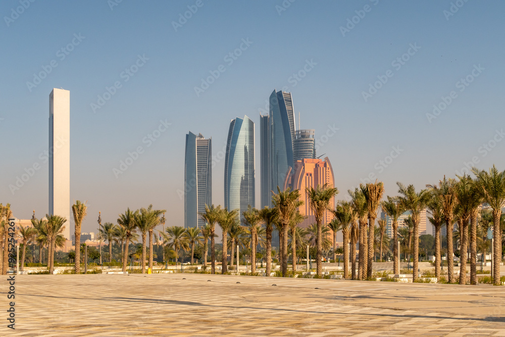 Φωτογραφία Abu Dhabi landscape downtown and financial district view with modern skyscrapers and palm trees, United Arab Emirates
