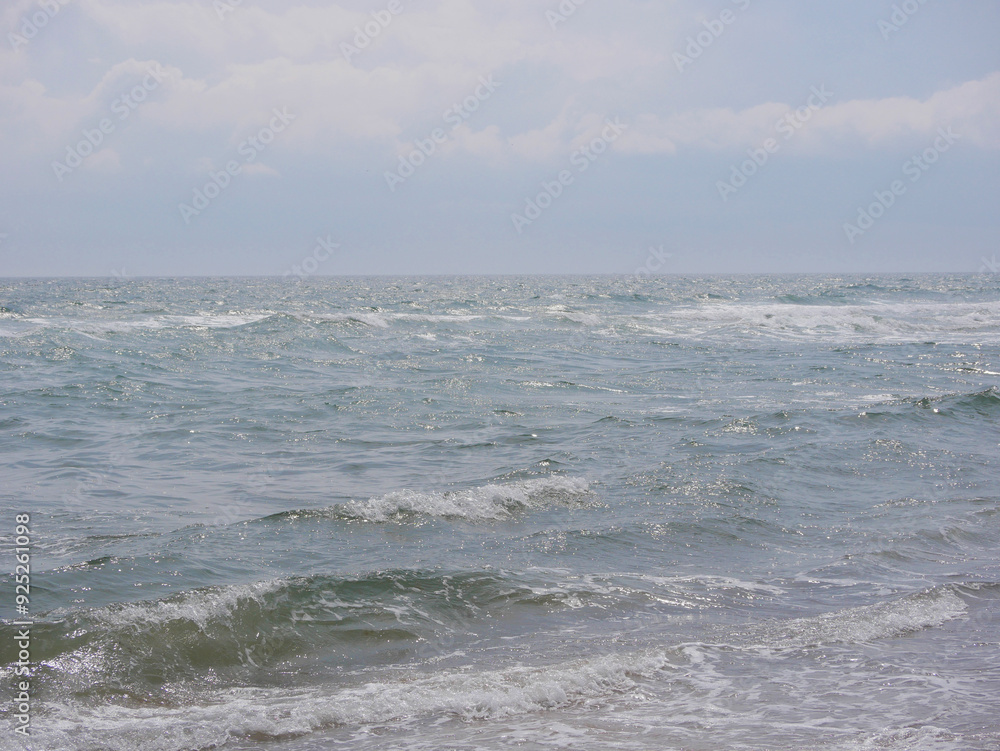 Seascape under a cloudy sky. Skagerrak, Kattegat strait in Skagen, Denmark Seascape under a cloudy sky. Skagerrak, Kattegat strait in Skagen, Denmark