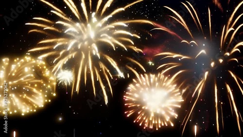 video of vibrant fireworks bursting in night sky, with colorful explosions lighting up darkness, for themes of celebration, festivals, joyous occasions