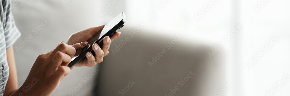 Woman using smartphone online searching on internet. Woman using smartphone online searching on internet.