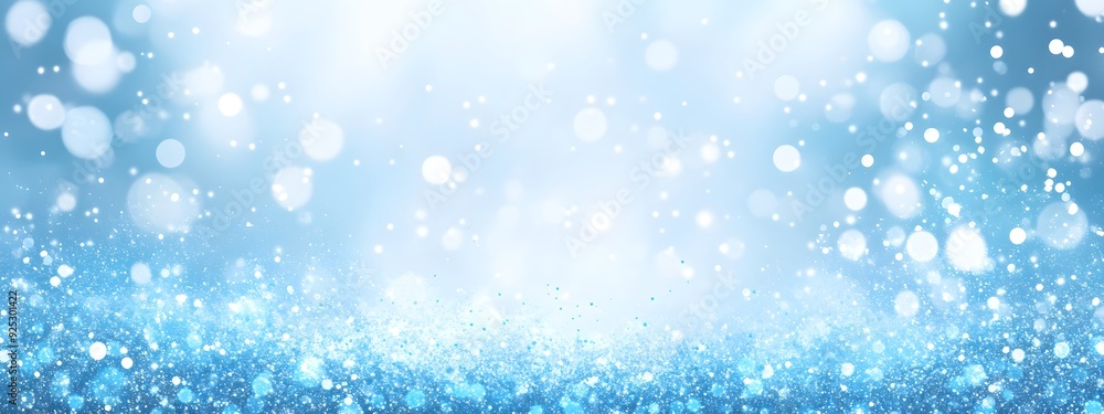 Abstract blue watercolor background with snowflakes and glitter, a Christmas wallpaper design with copy space for text. Abstract blue watercolor background with snowflakes and glitter, a Christmas wallpaper design with copy space for text.