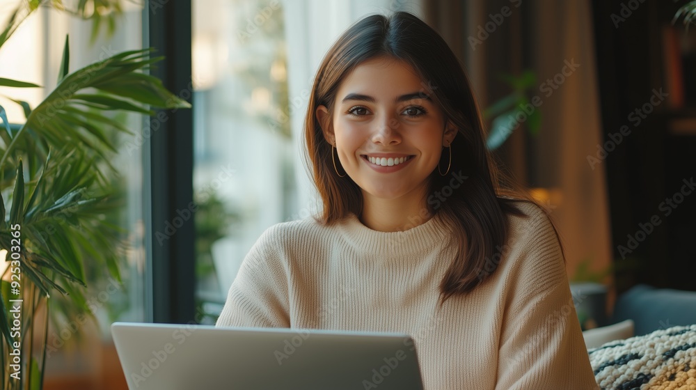 Smiling Woman Working on Laptop at Home Office Smiling Woman Working on Laptop at Home Office