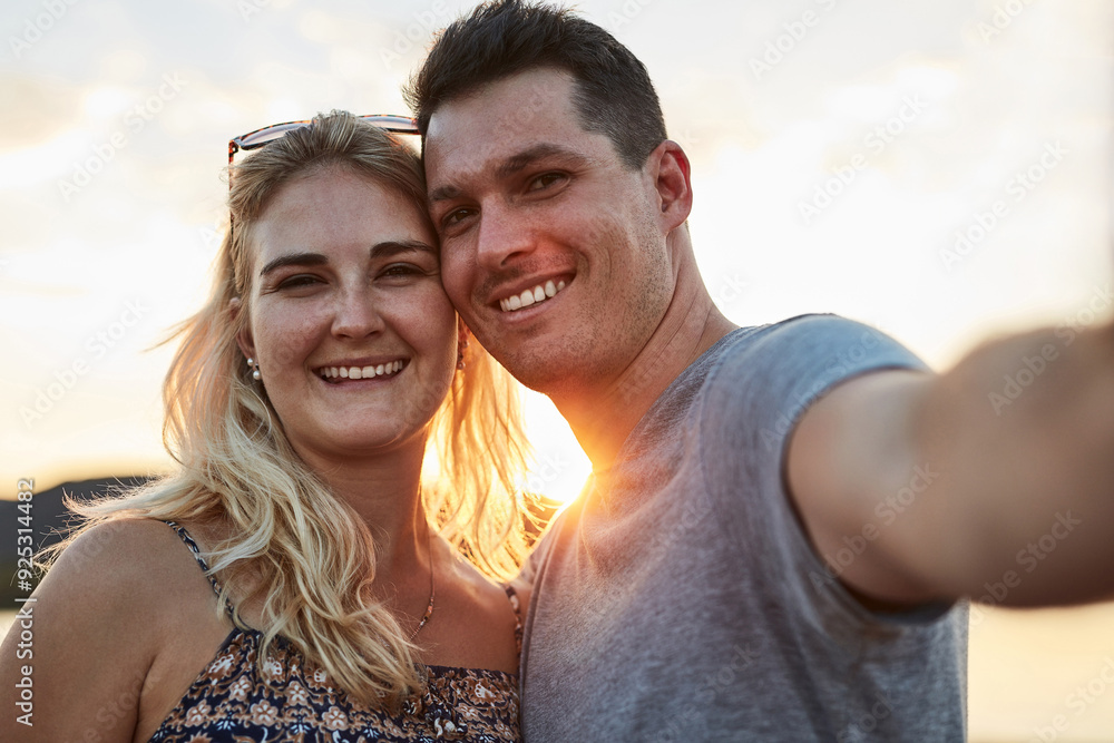 Couple, selfie and sunset in nature for vacation, relax and travel with love, memory and leisure in California. People, portrait and happy for holiday, relationship and adventure with smile by lake Couple, selfie and sunset in nature for vacation, relax and travel with love, memory and leisure in California. People, portrait and happy for holiday, relationship and adventure with smile by lake
