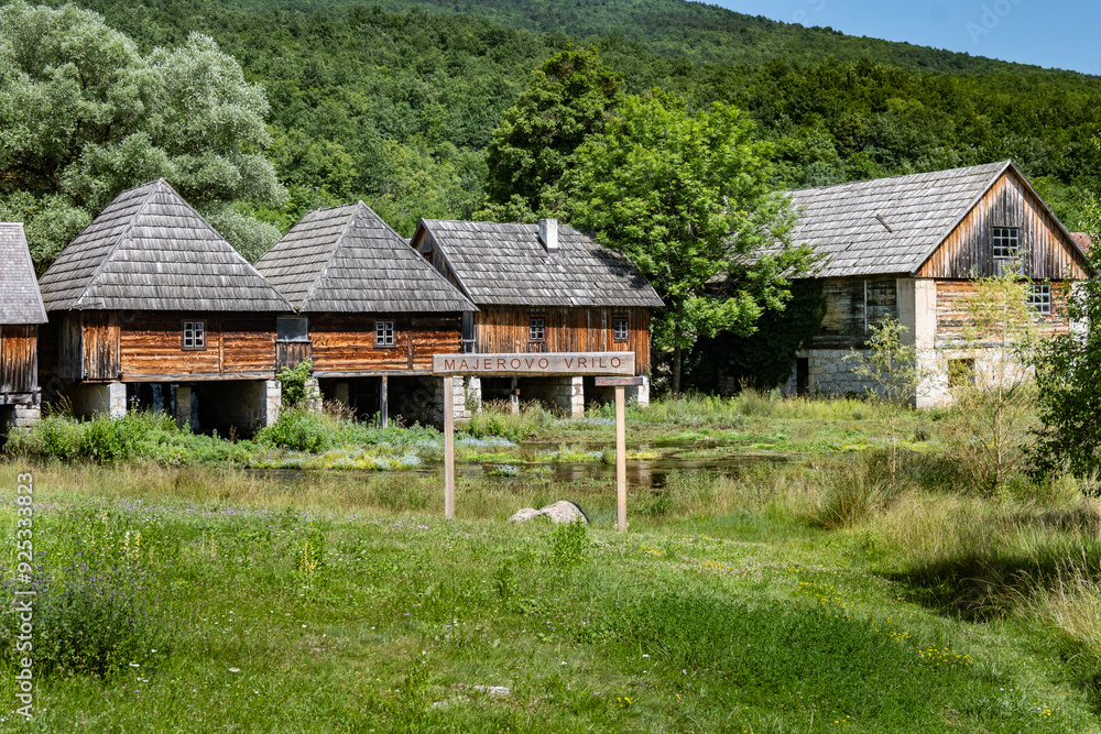 Majerovo Vrilo, beautiful wooden mill houses on the spring of Gacka river, Croatia, one of the last mills preserved in this mountain region Majerovo Vrilo, beautiful wooden mill houses on the spring of Gacka river, Croatia, one of the last mills preserved in this mountain region