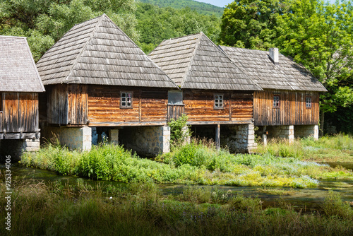 Majerovo Vrilo, beautiful wooden mill houses on the spring of Gacka river, Croatia, one of the last mills preserved in this mountain region photo