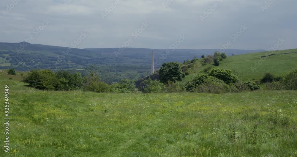 wide shot of open fields with factory chimney and the great Ridge in background taken on siggate road wide shot of open fields with factory chimney and the great Ridge in background taken on siggate road