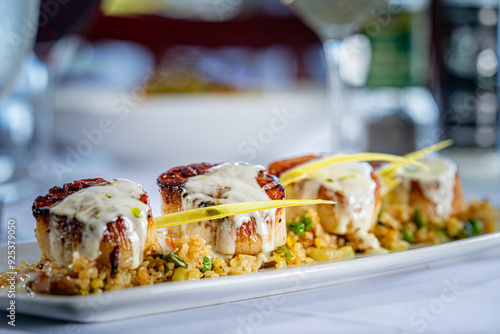 U-10 Diver Scallops, Kombu Dusted, Sesame Oil Caramelized, Smoked Duck Fried Rice, Matsutake Dashi Beurre Blanc