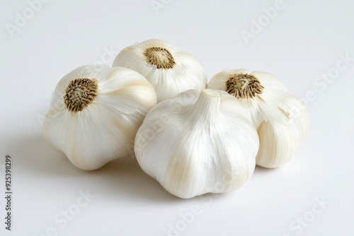 Whole Garlic Bulbs With Cloves on a White Background in Bright Daylight , ai