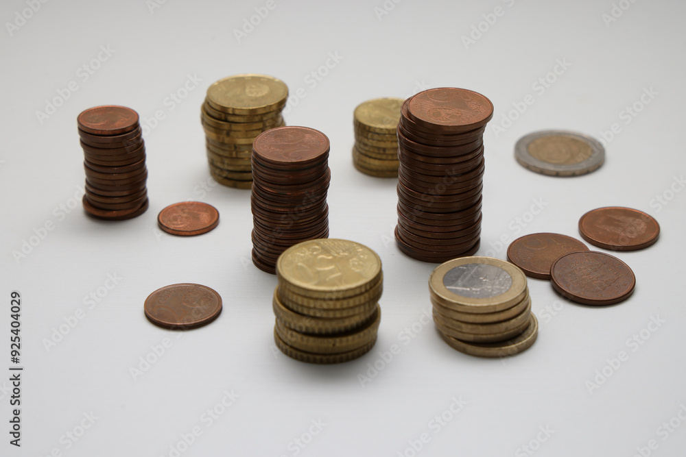 Euro coins of different amounts stacked Euro coins of different amounts stacked