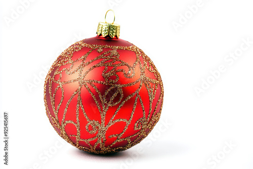 Red Christmas ornament with gold glitter pattern on white background photo