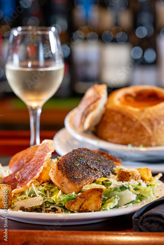 Blackened Salmon Salad with Tomato Soup in a bread bowl.