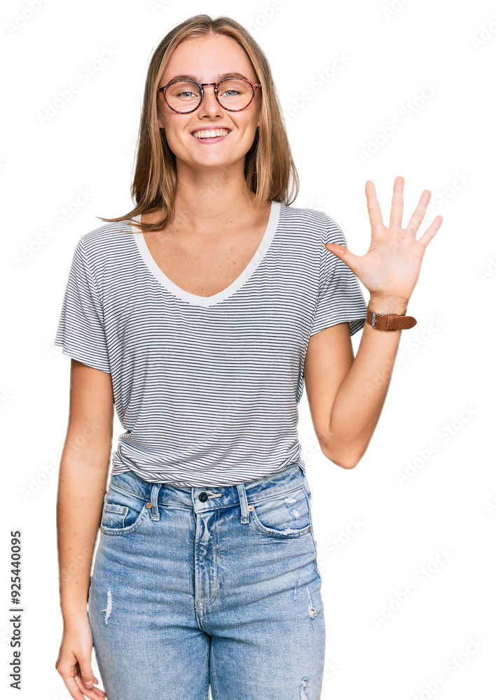 Beautiful young blonde woman wearing casual clothes and glasses showing and pointing up with fingers number five while smiling confident and happy. Beautiful young blonde woman wearing casual clothes and glasses showing and pointing up with fingers number five while smiling confident and happy.