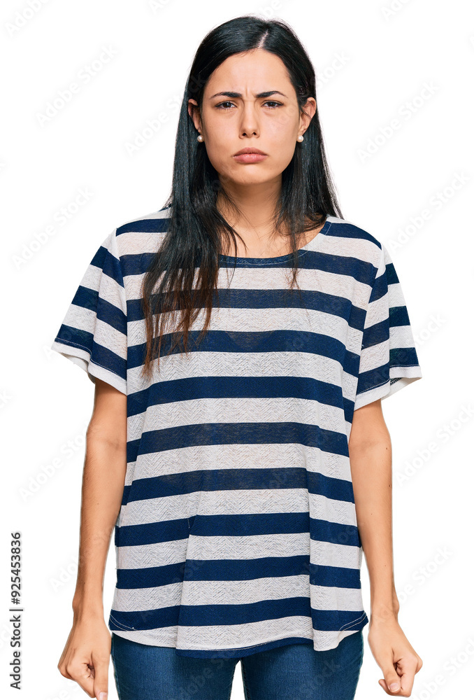 Beautiful young woman wearing casual clothes skeptic and nervous, frowning upset because of problem. negative person. Beautiful young woman wearing casual clothes skeptic and nervous, frowning upset because of problem. negative person.