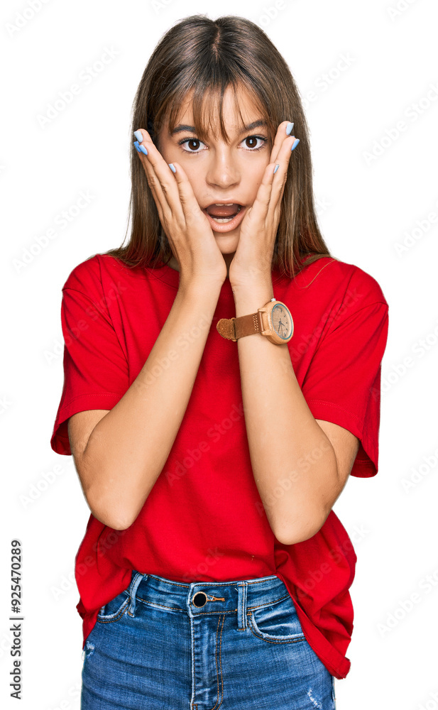 Teenager caucasian girl wearing casual red t shirt afraid and shocked, surprise and amazed expression with hands on face Teenager caucasian girl wearing casual red t shirt afraid and shocked, surprise and amazed expression with hands on face