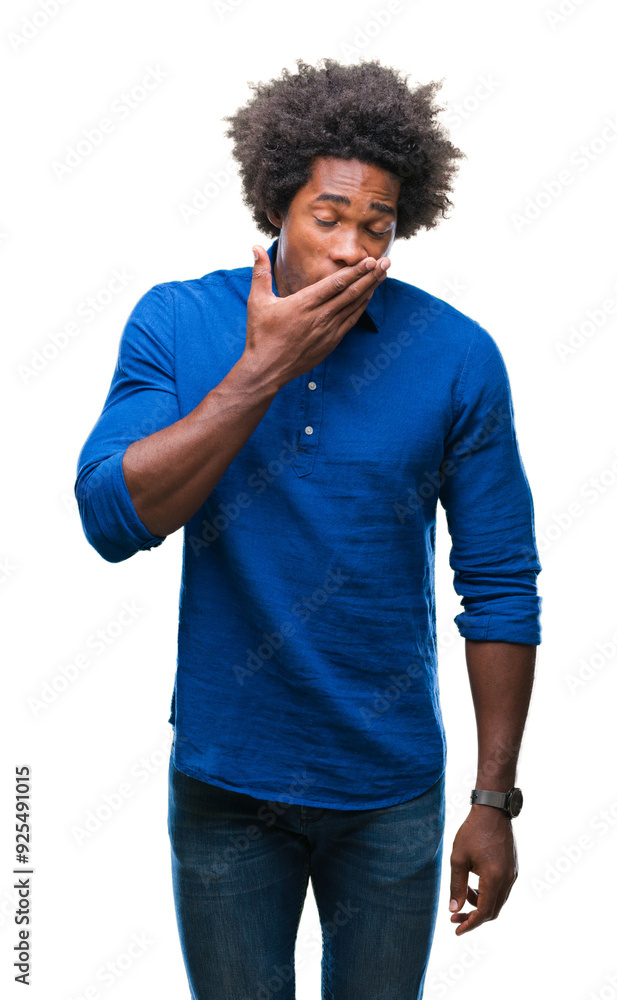 Afro american man over isolated background bored yawning tired covering mouth with hand. Restless and sleepiness. Afro american man over isolated background bored yawning tired covering mouth with hand. Restless and sleepiness.