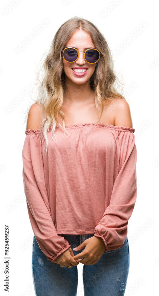 Beautiful young blonde woman wearing retro sunglasses over isolated background with a happy and cool smile on face. Lucky person. Beautiful young blonde woman wearing retro sunglasses over isolated background with a happy and cool smile on face. Lucky person.