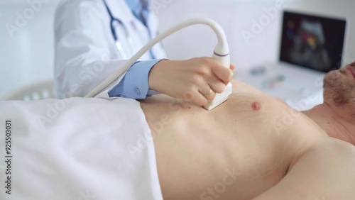 Doctor woman performing breast and heart ultrasound exam on man patient. Medicine service, cardiology