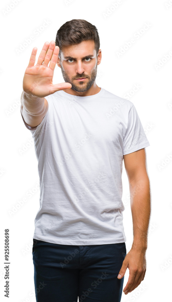 Young handsome man over isolated background doing stop sing with palm of the hand. Warning expression with negative and serious gesture on the face. Young handsome man over isolated background doing stop sing with palm of the hand. Warning expression with negative and serious gesture on the face.