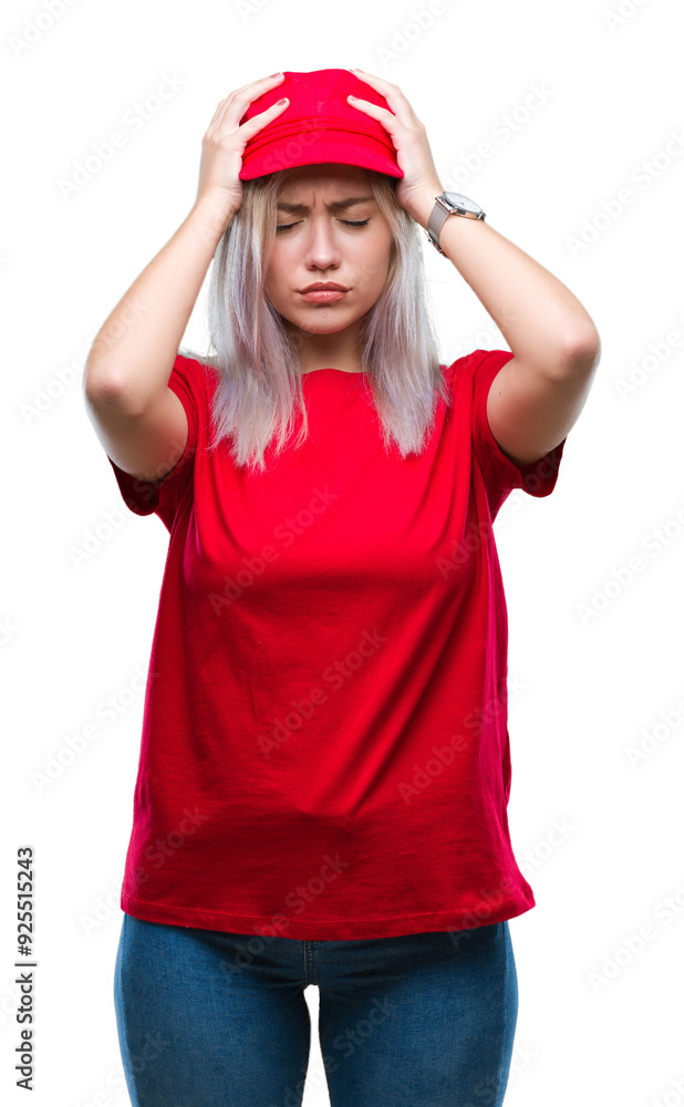 Young blonde woman wearing red hat over isolated background suffering from headache desperate and stressed because pain and migraine. Hands on head. Young blonde woman wearing red hat over isolated background suffering from headache desperate and stressed because pain and migraine. Hands on head.