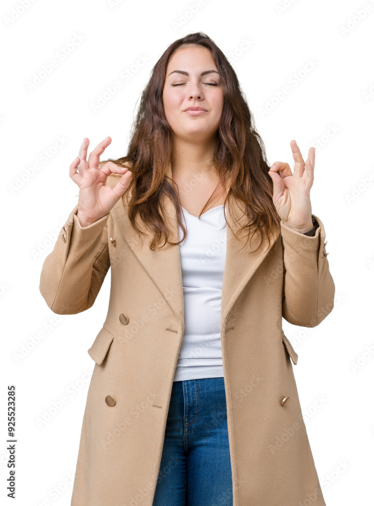 Beautiful plus size young woman wearing winter coat over isolated background relax and smiling with eyes closed doing meditation gesture with fingers. Yoga concept. Beautiful plus size young woman wearing winter coat over isolated background relax and smiling with eyes closed doing meditation gesture with fingers. Yoga concept.