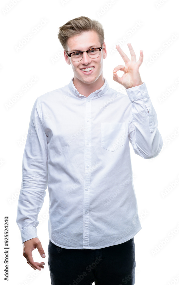 Young handsome blond man smiling positive doing ok sign with hand and fingers. Successful expression. Young handsome blond man smiling positive doing ok sign with hand and fingers. Successful expression.