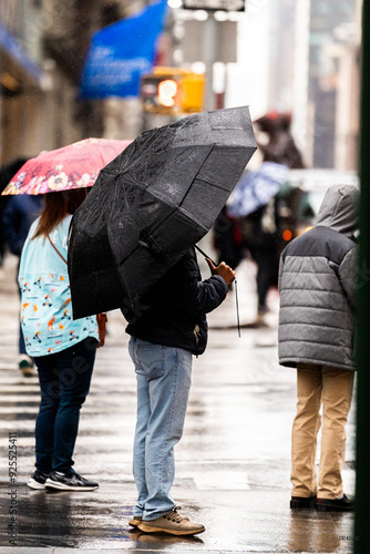 people walking in rain