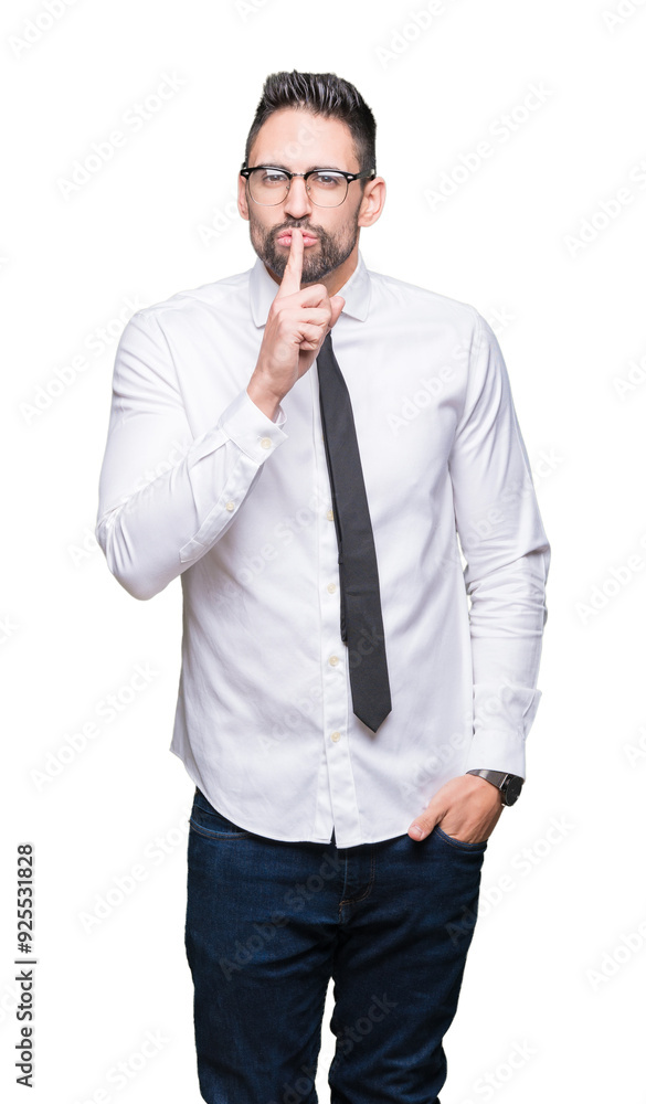 Young handsome business man wearing glasses over isolated background asking to be quiet with finger on lips. Silence and secret concept. Young handsome business man wearing glasses over isolated background asking to be quiet with finger on lips. Silence and secret concept.