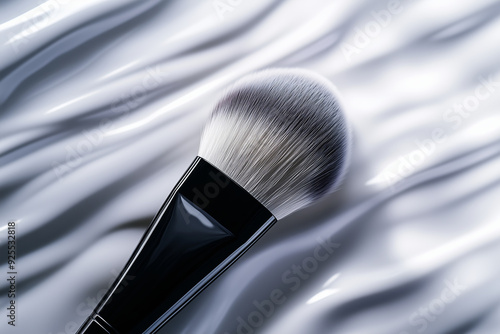 Close-Up of Makeup Brush with Soft Bristles on Glossy Surface, High-Quality Detail photo