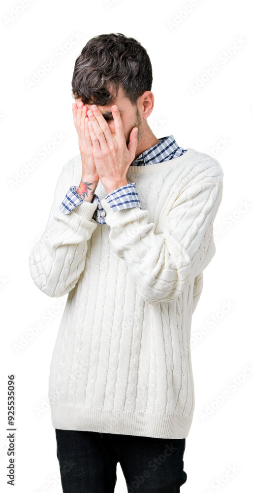 Young handsome man wearing winter sweater over isolated background with sad expression covering face with hands while crying. Depression concept. Young handsome man wearing winter sweater over isolated background with sad expression covering face with hands while crying. Depression concept.