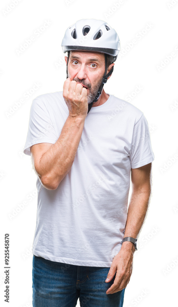 Middle age senior hoary cyclist man wearing bike safety helment isolated background looking stressed and nervous with hands on mouth biting nails. Anxiety problem. Middle age senior hoary cyclist man wearing bike safety helment isolated background looking stressed and nervous with hands on mouth biting nails. Anxiety problem.