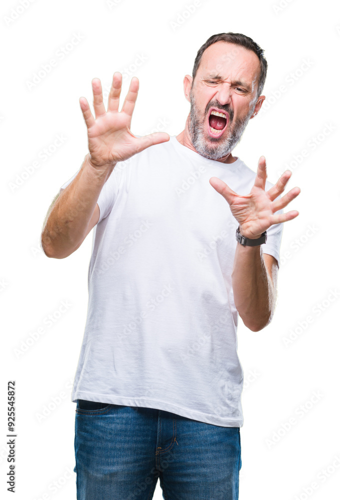 Middle age hoary senior man wearing white t-shirt over isolated background afraid and terrified with fear expression stop gesture with hands, shouting in shock. Panic concept. Middle age hoary senior man wearing white t-shirt over isolated background afraid and terrified with fear expression stop gesture with hands, shouting in shock. Panic concept.