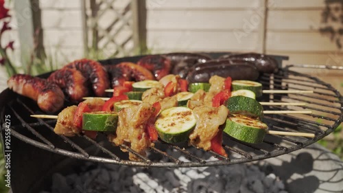 cooking on the barbecue in the garden during summer bbq