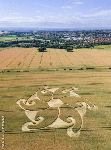 Aerial view of an intricate geometric crop circle formation in a wheat field near Etchilhampton and Devizes in Wiltshire, England, UK