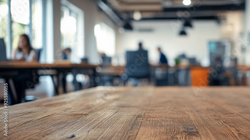 empty wooden table in the foreground. blurred background of a modern office with large windows. business meeting, meeting in the office