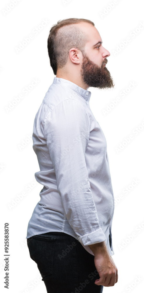 Young caucasian hipster man over isolated background looking to side, relax profile pose with natural face with confident smile. Young caucasian hipster man over isolated background looking to side, relax profile pose with natural face with confident smile.