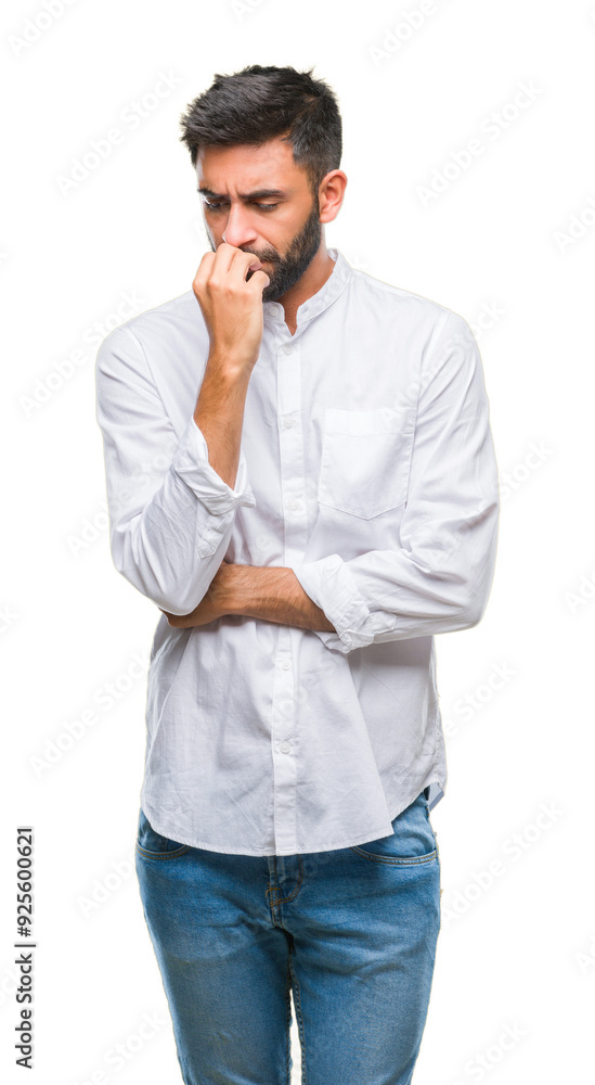 Adult hispanic man over isolated background looking stressed and nervous with hands on mouth biting nails. Anxiety problem. Adult hispanic man over isolated background looking stressed and nervous with hands on mouth biting nails. Anxiety problem.