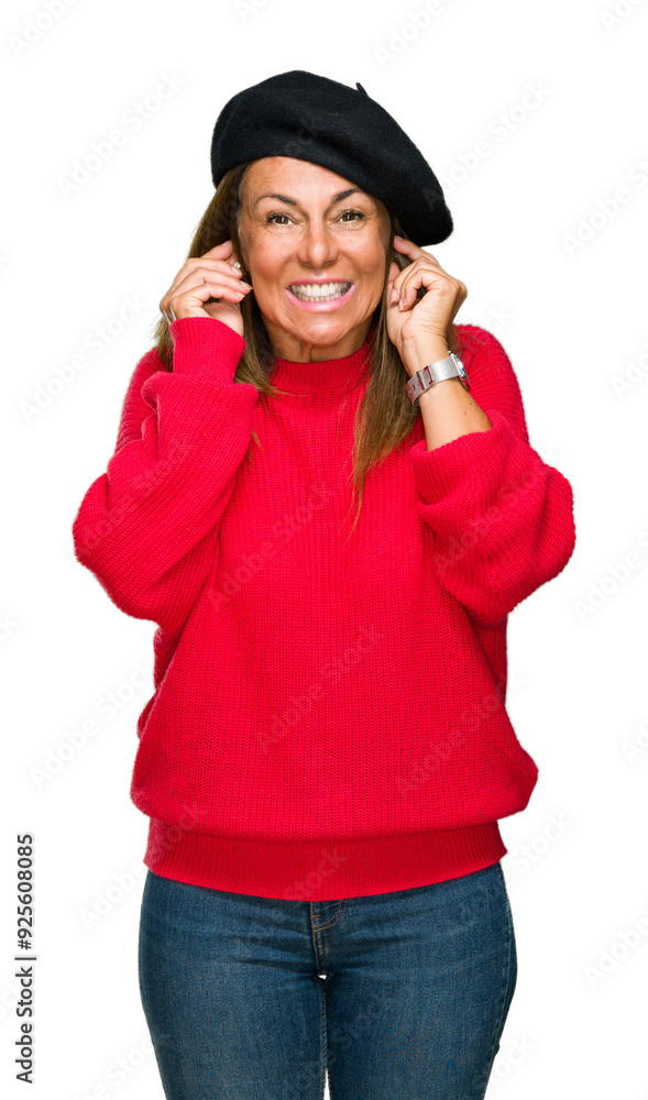 Middle age adult woman wearing fashion beret over isolated background covering ears with fingers with annoyed expression for the noise of loud music. Deaf concept. Middle age adult woman wearing fashion beret over isolated background covering ears with fingers with annoyed expression for the noise of loud music. Deaf concept.