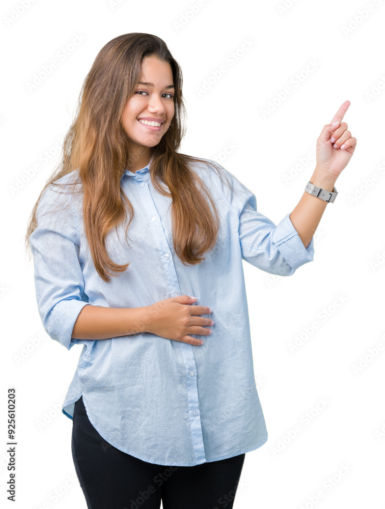 Young beautiful brunette business woman over isolated background with a big smile on face, pointing with hand and finger to the side looking at the camera. Young beautiful brunette business woman over isolated background with a big smile on face, pointing with hand and finger to the side looking at the camera.