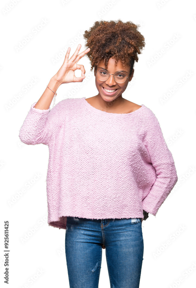 Beautiful young african american woman wearing glasses over isolated background smiling positive doing ok sign with hand and fingers. Successful expression. Beautiful young african american woman wearing glasses over isolated background smiling positive doing ok sign with hand and fingers. Successful expression.