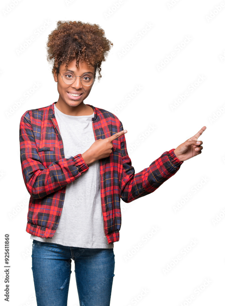 Beautiful young african american woman wearing glasses over isolated background smiling and looking at the camera pointing with two hands and fingers to the side. Beautiful young african american woman wearing glasses over isolated background smiling and looking at the camera pointing with two hands and fingers to the side.