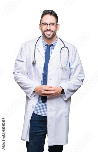 Handsome young doctor man over isolated background Hands together and fingers crossed smiling relaxed and cheerful. Success and optimistic